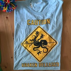 NWOT Baby Blue Tee: Caution Kraken Released